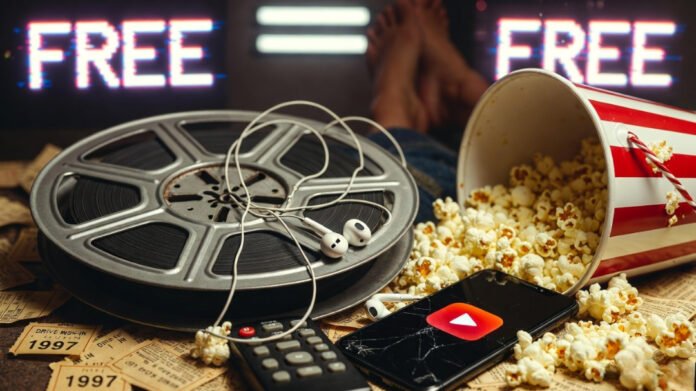 A tangled old film reel wrapped in cheap earbuds, spilled popcorn from a striped bucket, cracked phone showing a play button, buried remote and 1997 drive-in stubs, with glitchy 